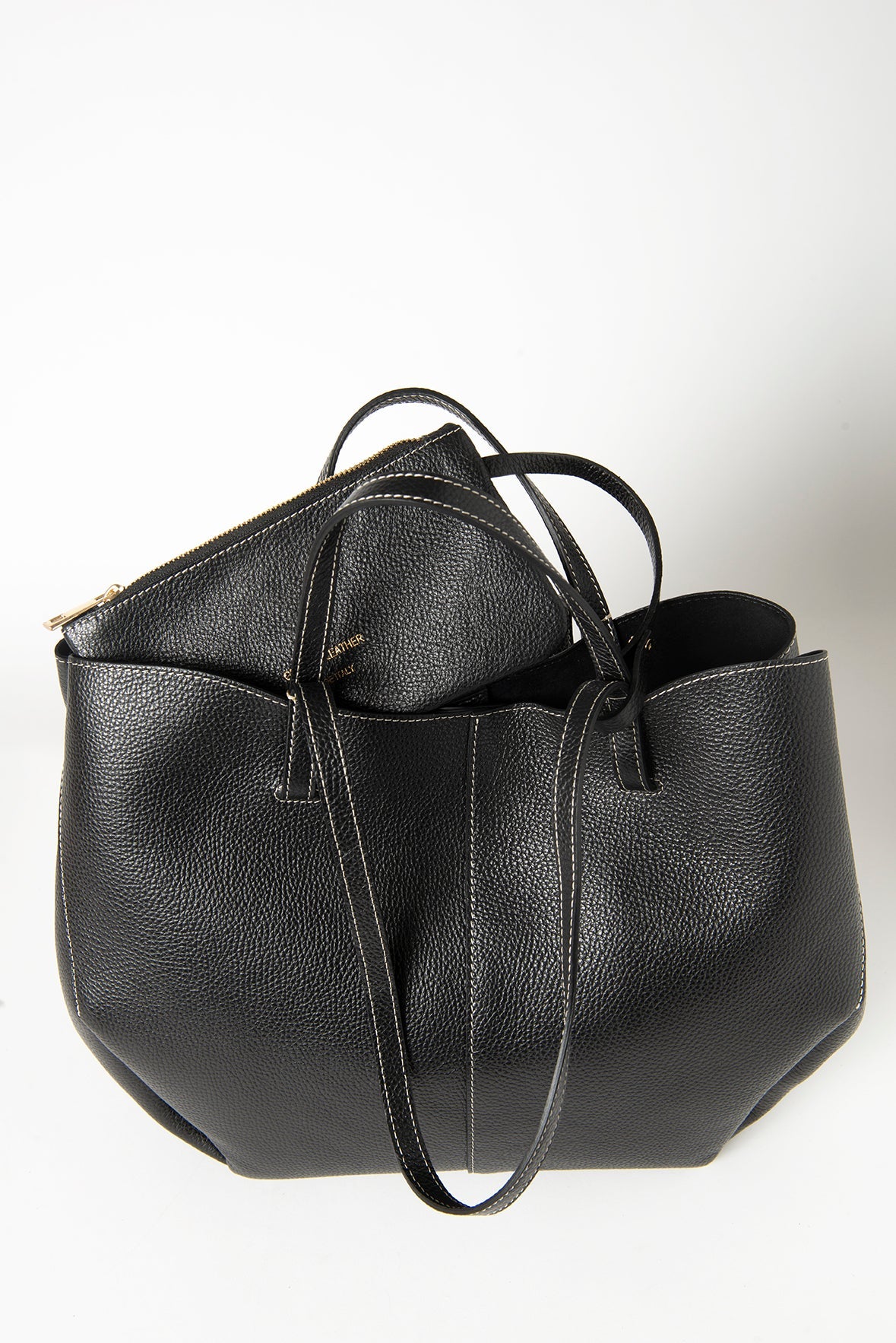 Elegant tote bag crafted from premium Italian leather, featuring a stylish, timeless design. Perfect for daily use or special occasions.